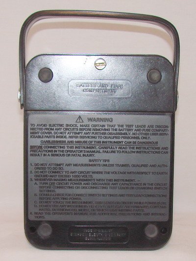 Figure 16 — The separate battery-and-fuse compartment door — present from Series 6 onward, and a fast visual tell
that a unit predates or postdates that split. Photo: simpson260.com (collector archive).